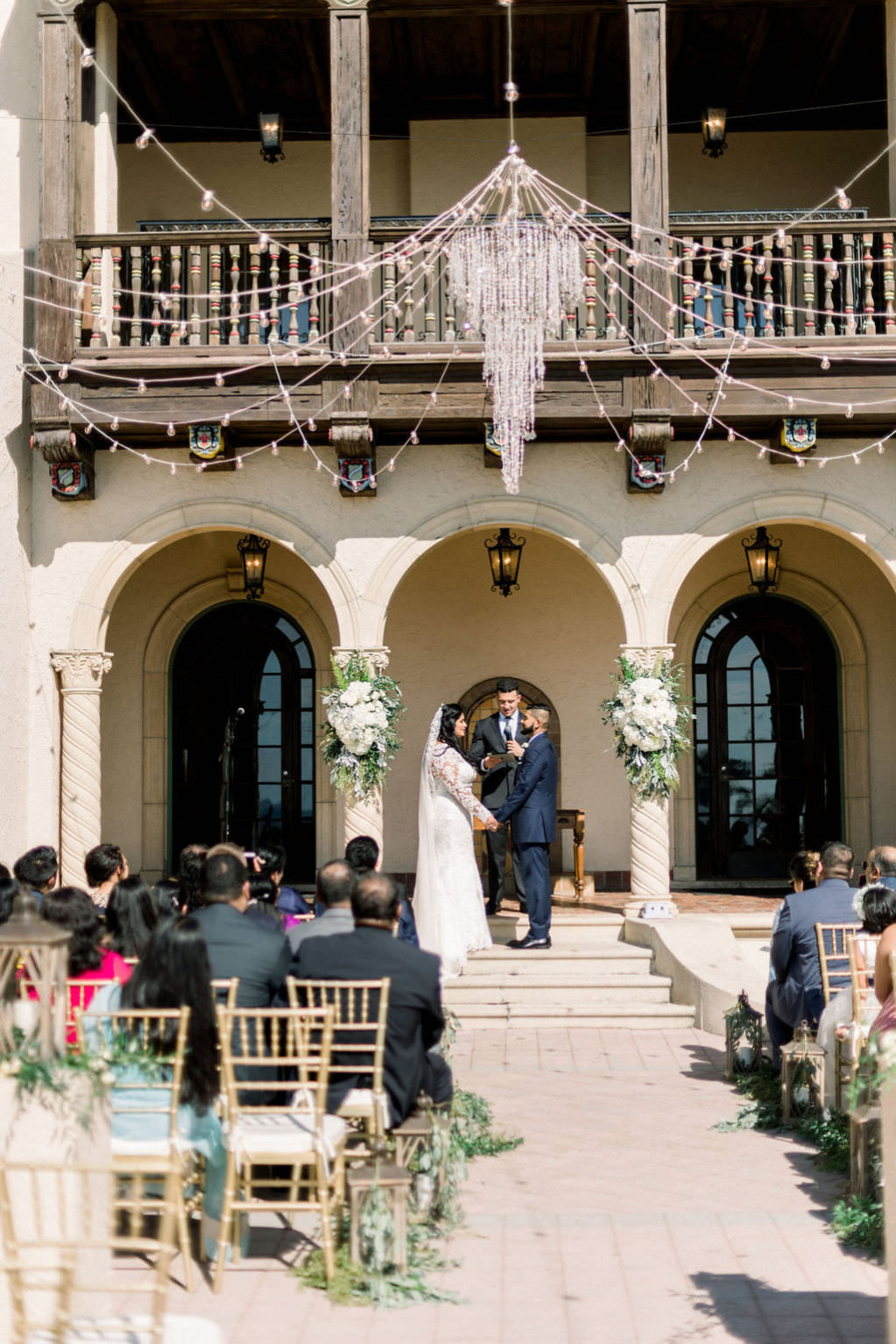 Elegant Powel Crosley Estate Wedding Ceremony, Outdoor Chandelier with String Lighting, Sarasota Wedding Planer Laura Detwiler Events