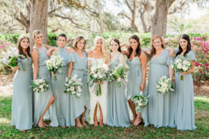 INSTAGRAM Boho Chic Inspired Bride and Bridesmaids in Mismatched Dusty Blue Long Dresses with Organic White, Ivory, Blush Pink Floral and Greenery Bouquets Bridal Party Portrait | South Tampa Wedding Hair and Makeup Artist LDM Beauty Group