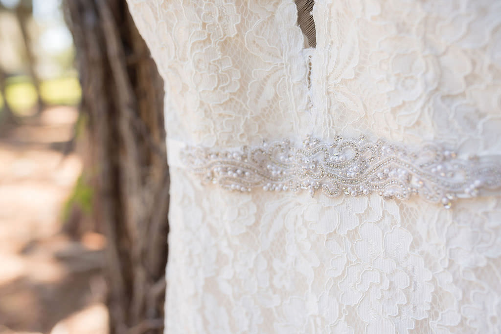 Mikaella Lace Wedding Dress with Plunging V Neckline and Capsleeves and Rhinestone Crystal Belt | Tampa Bay Kristen Marie Photography