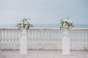 Romantic Boho Chic Wedding Ceremony Decor, Two White Pedestals with White and Greenery Floral Bouquets | Planner Parties A'la Carte | Florist Bruce Wayne Florals