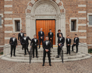 Tampa Bay Groom and Groomsmen Wedding Party Portrait Outside Traditional Wedding Ceremony Venue St. Mary's Catholic Church