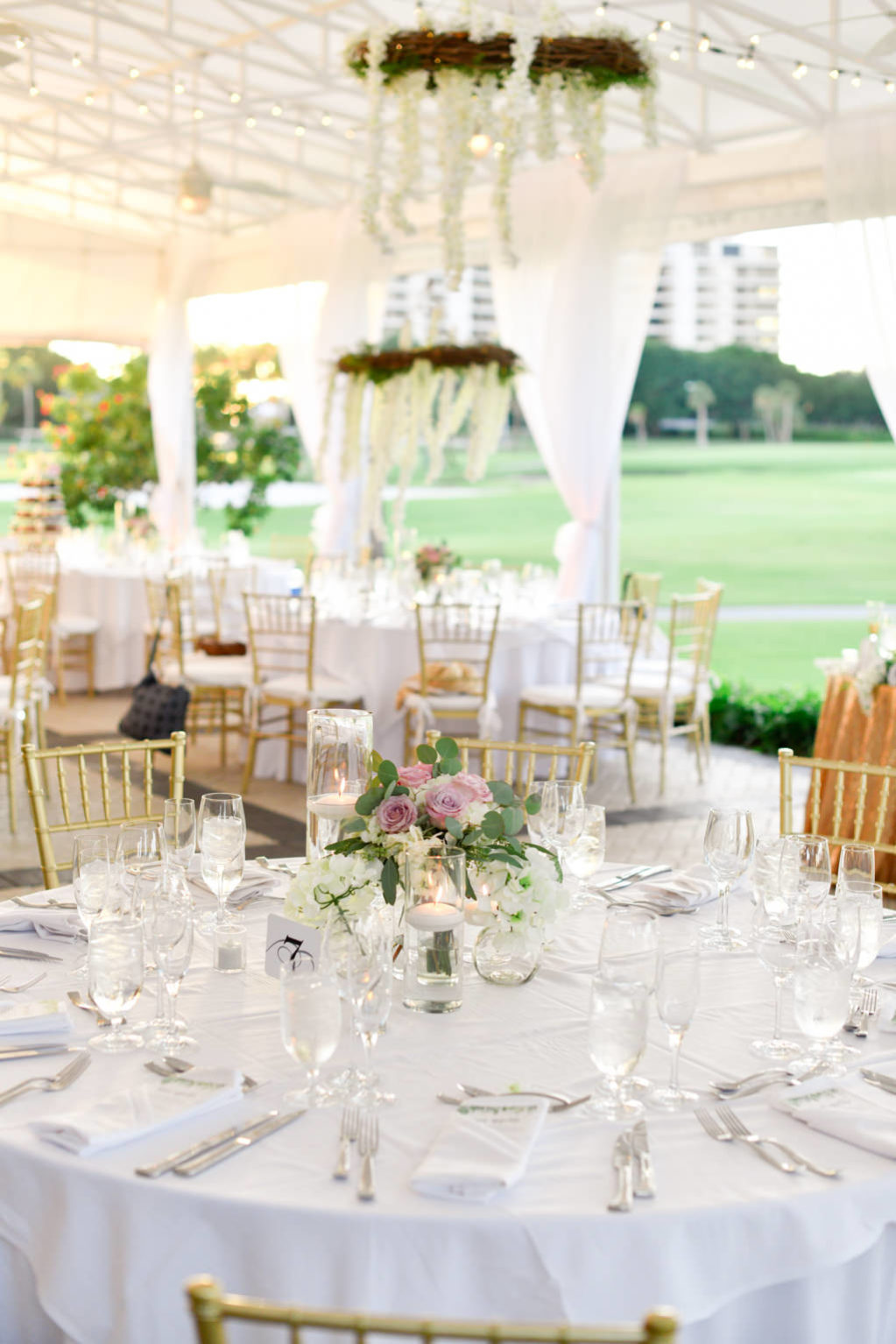 Tropical, Classy Elegant Wedding Reception Decor, Round Tables with White Tablecloths, Gold Chiavari Chairs, Low Purple, Greenery Floral Centerpieces | Sarasota Wedding Venue The Resort at Longboat Key Club