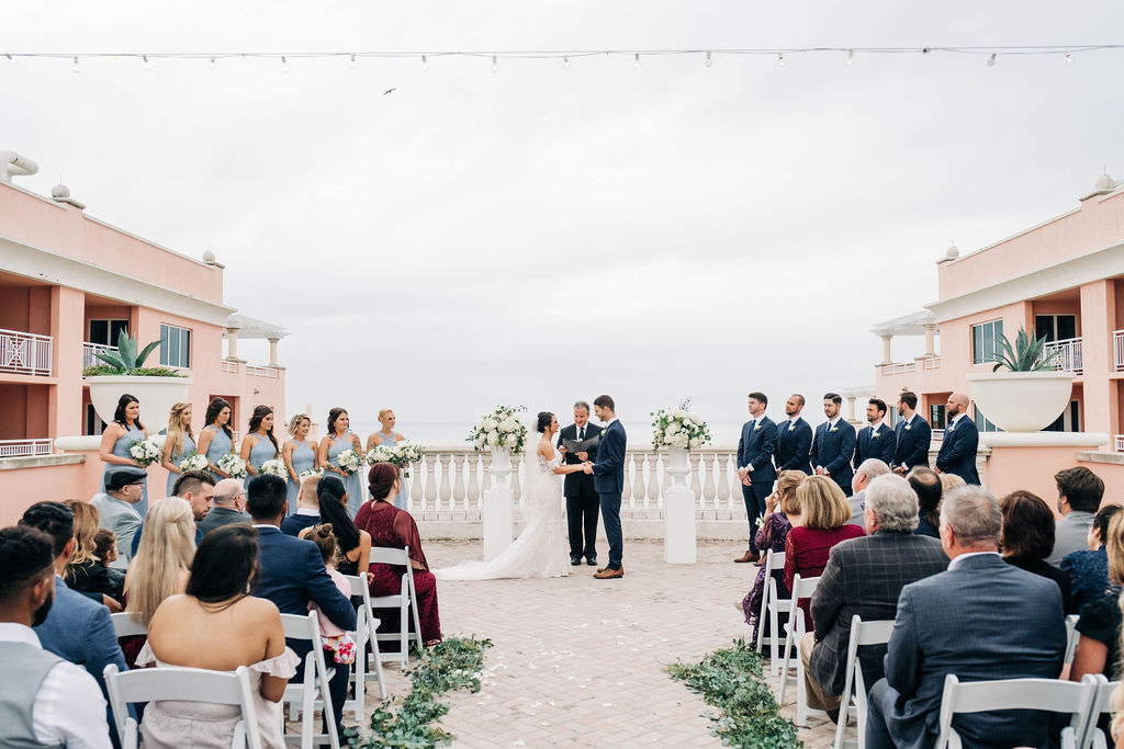 Tampa Bay Bride and Groom Exchanging Vows Wedding Ceremony Portrait | Waterfront Hotel Wedding Venue Hyatt Regency Clearwater Beach | Planner Parties A'la Carte