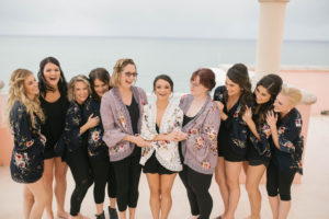 Tampa Bay Bride and Bridesmaids in Floral Black and Taupe Robes | Waterfront Tampa Bay Wedding Venue Hyatt Regency Clearwater Beach
