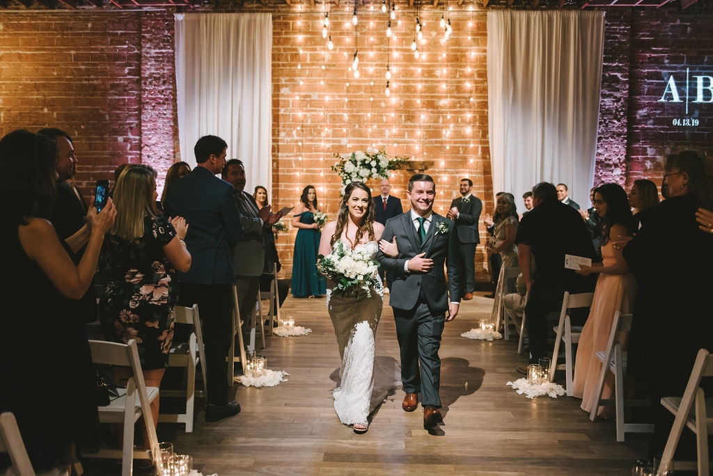 Florida Bride and Groom, Modern, Rustic Industrial Indoor Wedding Ceremony, Just Married, Recessional, White and Greenery Decor | Downtown St. Pete Venue NOVA 535 | Tampa Bay Photographer Kera Photography