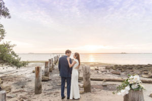 Dunedin Florida Outdoor Beach Sunset Bride and Groom Wedding Portrait | Tampa Bay Wedding Photographer Kristen Marie Photography