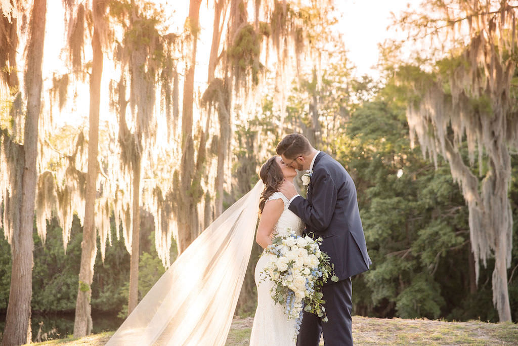Florida Bride and Groom Sunset Golf Course Wedding Portrait, Long Cathedral Veil | Tampa Bay Kristen Marie Photography | Innisbrook Golf & Spa Resort Wedding Venue