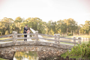 Palm Harbor Bride and Groom Sunset Wedding Portrait on Bridge | Tampa Bay Wedding Photographer Kristen Marie Photography | Innisbrook Golf & Spa Resort Wedding Venue
