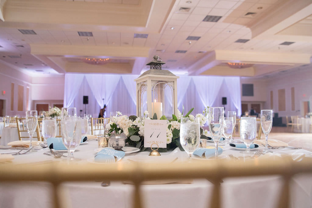 Classy, Rustic Wedding Reception Ballroom Decor, White Lantern with Ivory, White and Greenery Wreath | Tampa Bay Kristen Marie Photography | Rentals Gabro Event Services