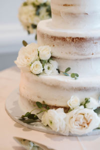 Semi Naked Wedding Cake Garnished with Real Ivory, White Rose Florals