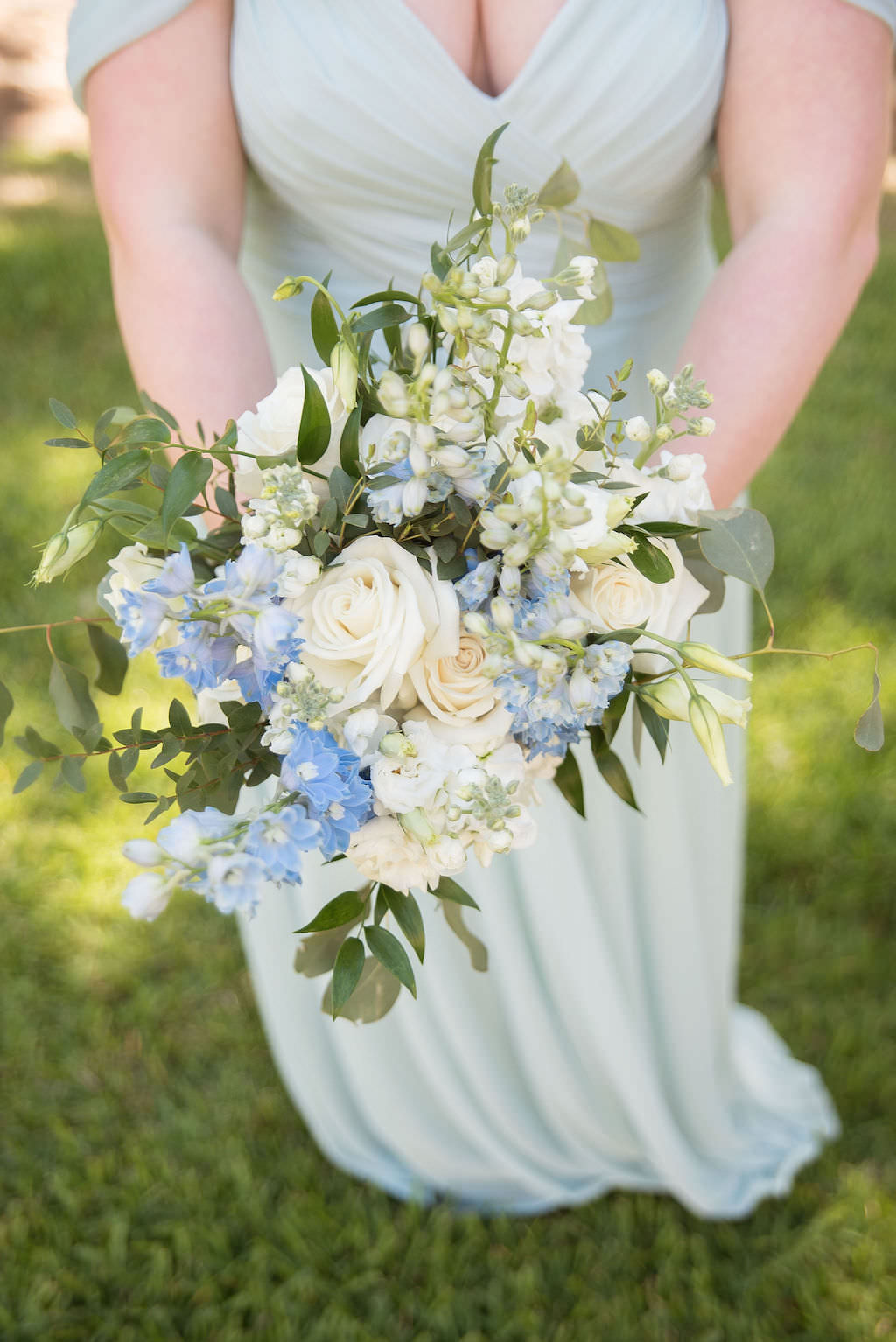 Bridesmaids in Long Flowy Classic Boho Style Powder Blue Dress Holding Ivory, White, Blue and Greenery Floral Bouquet | Tampa Bay Kristen Marie Photography | Bridesmaid Dress Shop Nikki's Glitz and Glam