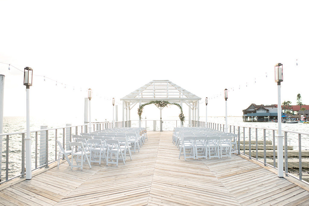 Waterfront Dockside Wedding Ceremony Under Cabana, Nautical Inspired Decor, Green Floral Arch | | Tampa Bay Hotel and Wedding Venue The Godfrey Hotel & Cabanas