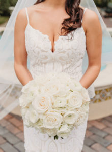 Classic Bride Wedding Portrait in Lace Spaghetti Strap Plunging Sweetheart Neckline Hayley Paige Wedding Dress with Traditional Round Ivory Rose and White Floral Bridal Bouquet
