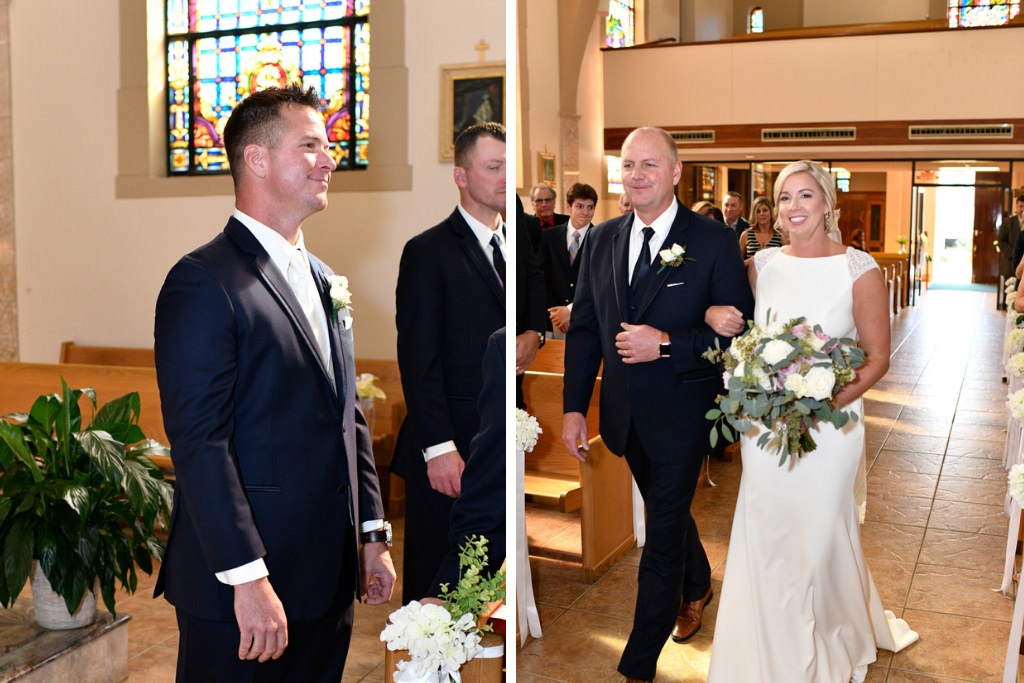 Groom Watching Bride Walking Down the Wedding Ceremony Aisle Portrait, Bride with Father Holding Garden Organic White, Ivory, Purple and Greenery Floral Bouquet | Sarasota Traditional Wedding Venue St. Martha Catholic Church