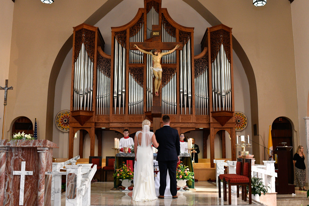Bride and Groom Exchanging Vows During Traditional Wedding Ceremony | Sarasota Wedding Venue St. Martha Catholic Church