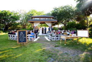 Elegant, Classic Garden Gazebo Wedding Ceremony Decor, White Draping, Pick a Seat Not a Side Chalkboard and Gold Frame Sign, Gold Vintage Furniture Accent Pieces | Sarasota Wedding Planner Laura Detwiler Events | Wedding Venue Marie Selby Botanical Gardens