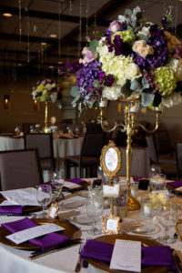 Elegant, Classic Vintage Garden Inspired Wedding Reception Decor, Tall Centerpieces, Gold Candelabra, Lilac, Purple, Green Hydrangeas, Blush Pink and Greenery Floral Arrangement, White Table Linen, Purple Napkins, Vintage Gold Frame Place Cards, Crystals Hanging From Ceiling | Sarasota Wedding Planner Laura Detwiler Events