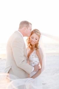 St. Pete Beach Bride and Groom at Sunset | Florida Beach Wedding Venue Hotel Zamora | Tampa Bay Wedding Photographer Lifelong Photography Studios