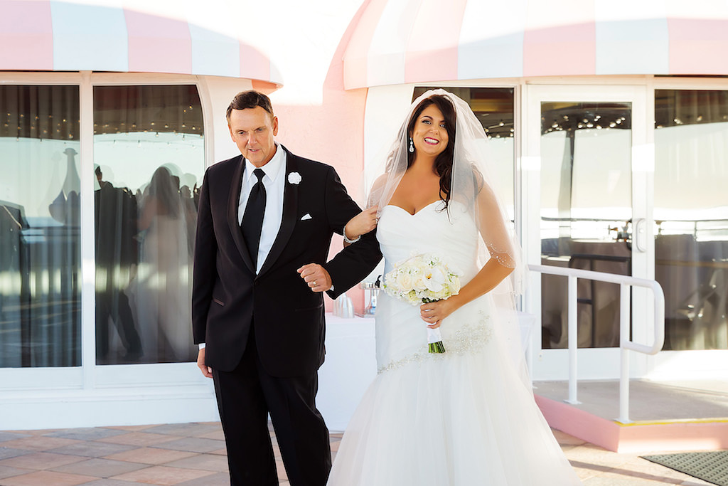 Tampa Bay Bride and Father Walk Down the Aisle at Rooftop Ceremony in Asymmetrical Mermaid Style Strapless Sweetheart Neckline Wedding Dress | Florida Historic Hotel Pink Palace The Don CeSar in St. Pete Beach