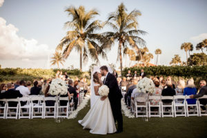 Classic, Formal Florida Bride and Groom Wedding Ceremony Exit Recessional Kiss | Waterfront Wedding Venue The Resort at Longboat Key Club