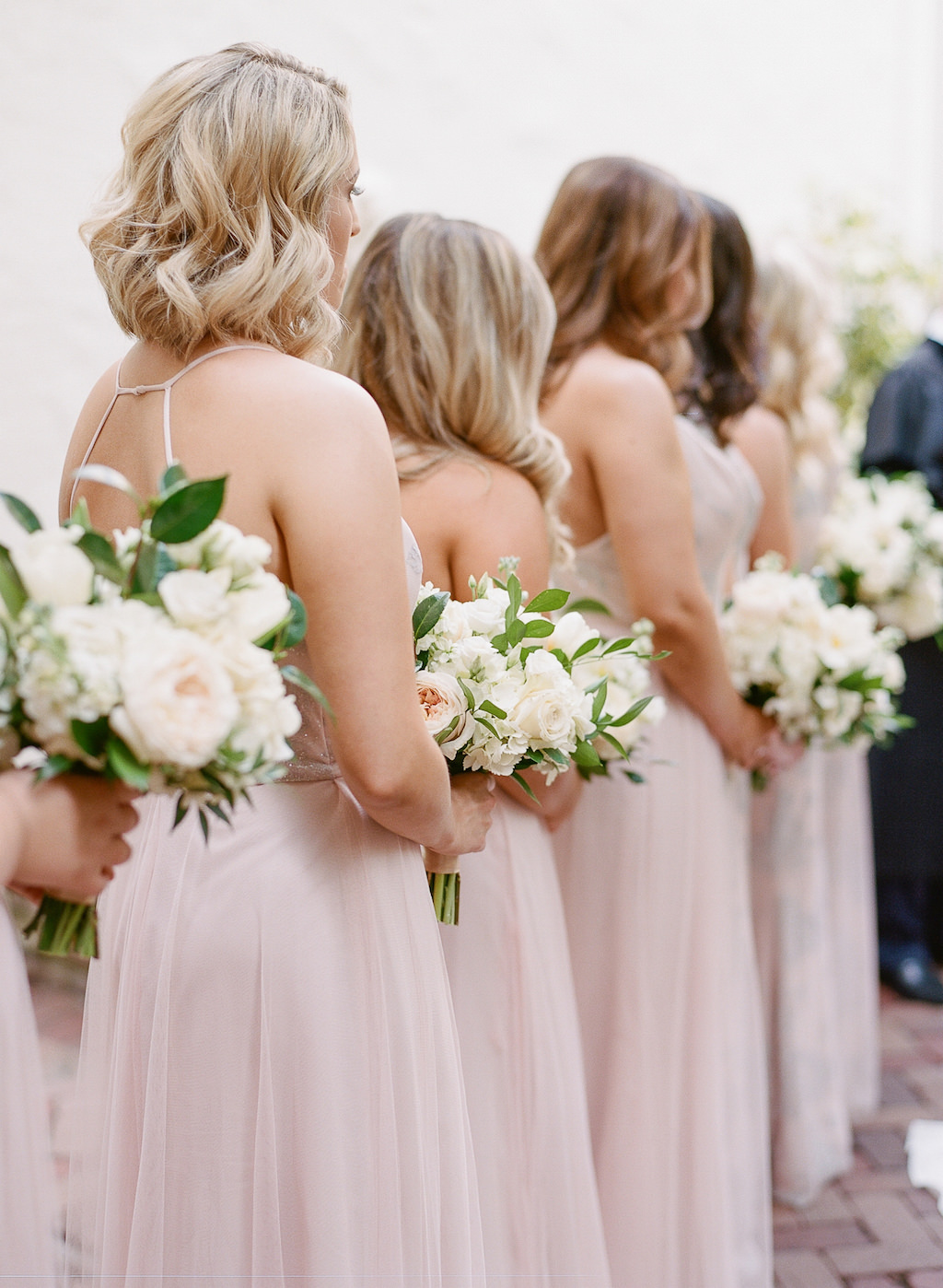 Florida Bridesmaids in Mix and Match Blush Pink Hayley Paige Dresses Holding Garden Inspired Classic White, Ivory and Blush Pink with Greenery Floral Bouquets Wedding Ceremony Portrait