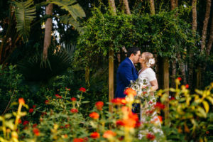 Intimate, Romantic Bride and Groom Garden Wedding Portrait | Outdoor Tropical Inspired St. Pete Wedding Venue | Sunken Gardens | Wedding Hair and Makeup Femme Akoi