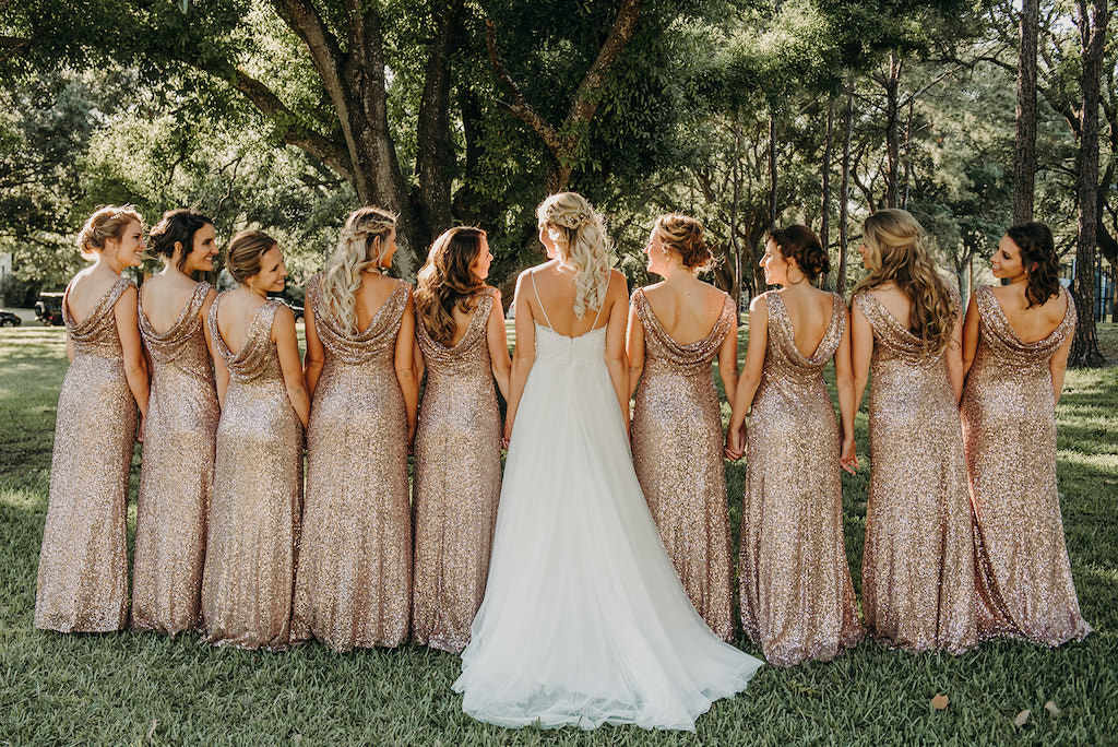 Outdoor Bride and Bridesmaids Wedding Photo, Bridesmaids in Matching Gold Sequin Glitter Sparkly Scoop Neck Dresses, Bride in Spaghetti Strap Lace Bodice and Tulle Skirt Wedding Dress | Tampa Bay Wedding Hair and Makeup Femme Akoi