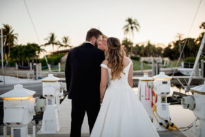 Florida Bride and Groom Boat Dock Sunset Wedding Portrait | Waterfront Wedding Venue The Resort at Longboat Key Club