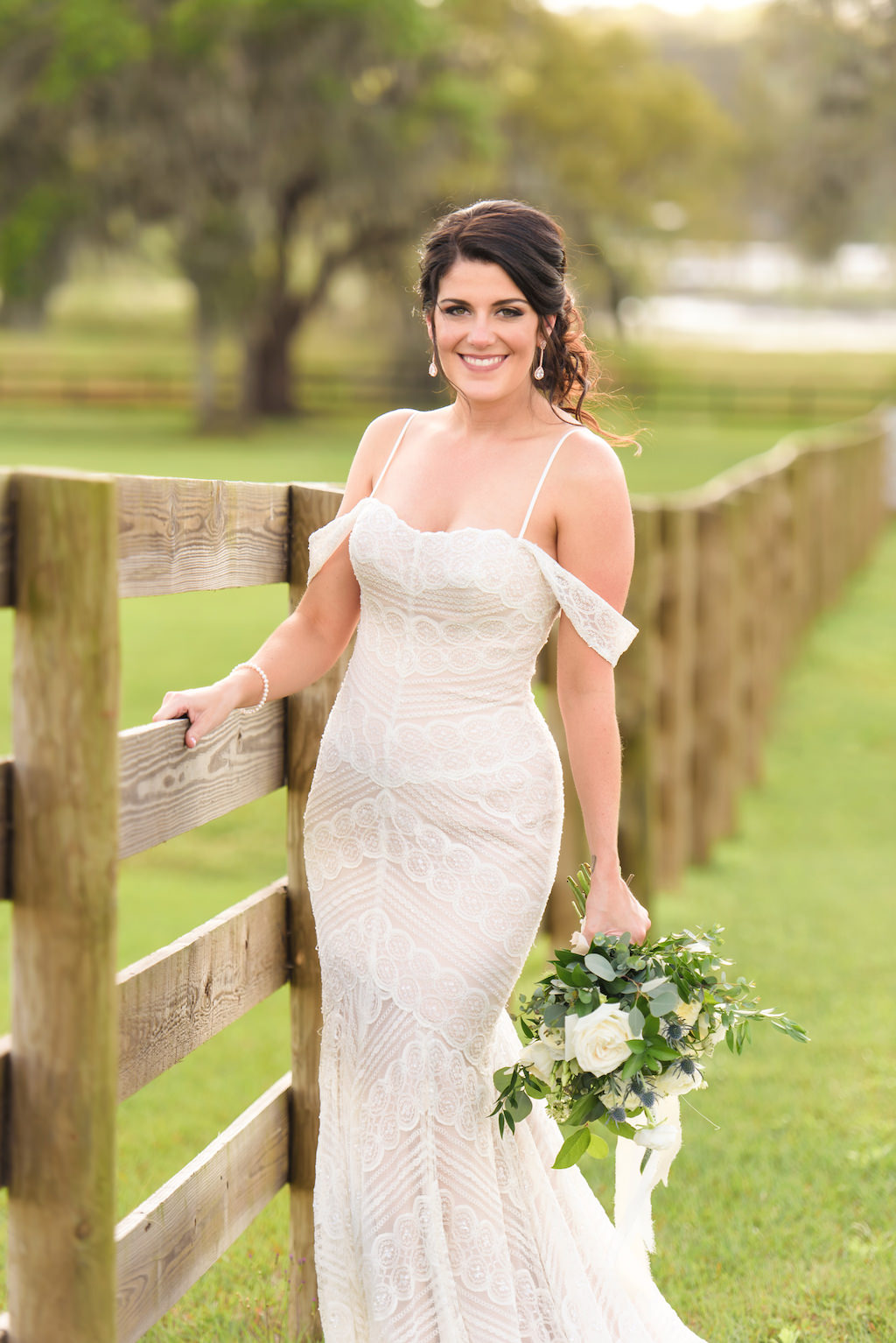 Classic Florida Bride Beauty Wedding Portrait in Wtoo Watters Lace Fitted Off the Shoulder Wedding Dress Holding Organic Greenery and White, Ivory Floral Bouquet | Tampa Bay Wedding Florist Bruce Wayne Florals