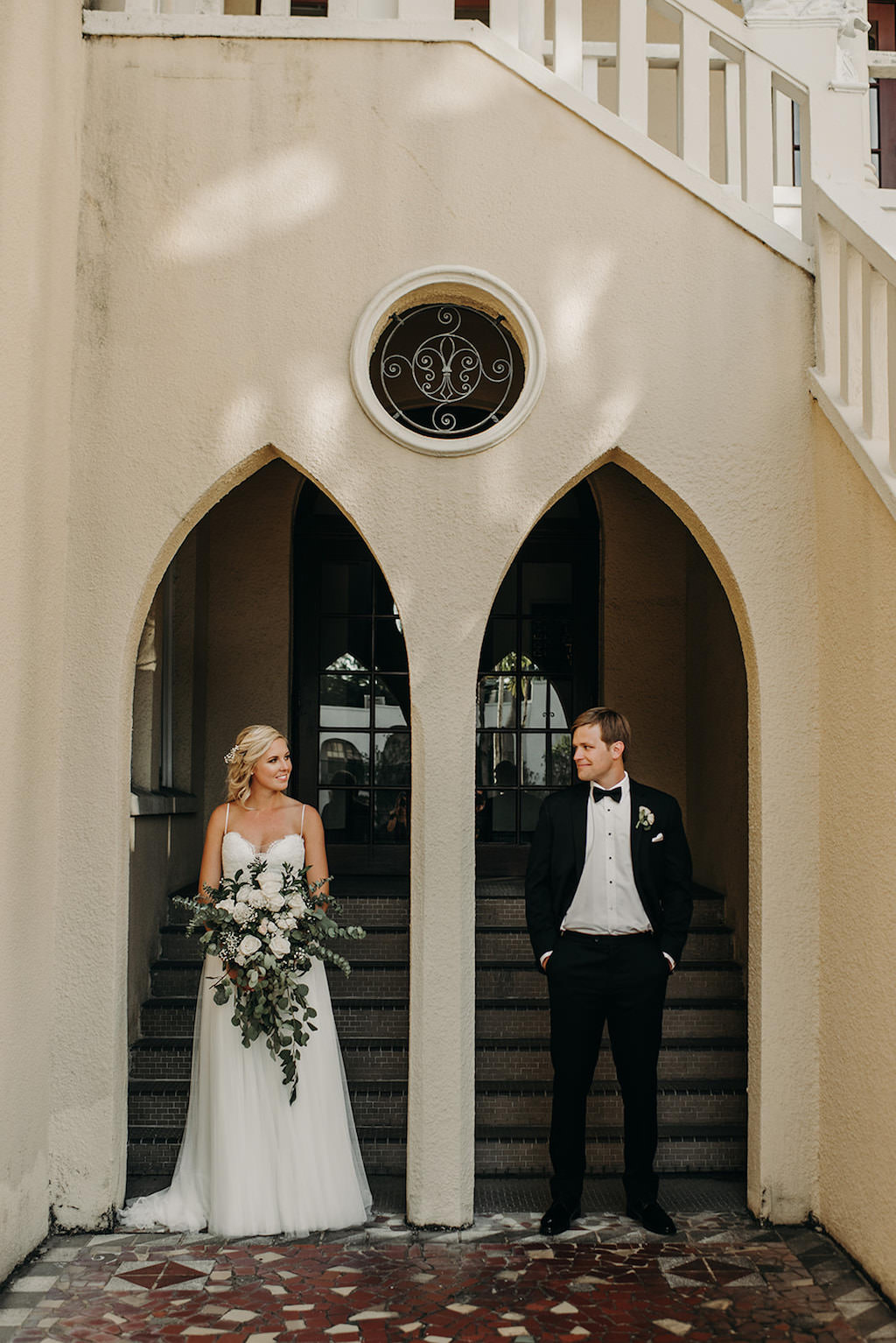 Bride and Groom First Look Wedding Portrait, Bride with Organic Greenery and White Ivory Floral Bouquet | Tampa Wedding Venue Davis Islands Garden Club
