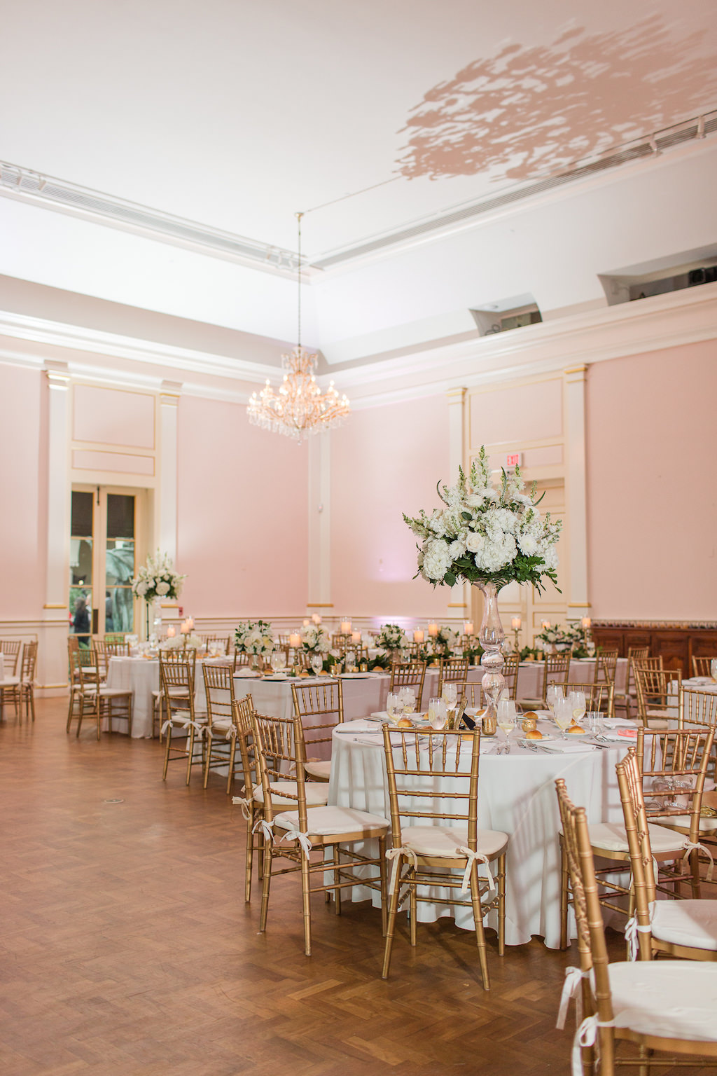 Classic, Romantic, Elegant Timeless Ballroom Wedding Reception Decor, Round Tables with White Linens, Gold Chiavari Chairs, Tall White Floral Centerpiece | St. Petersburg Wedding Venue Museum of Fine Arts | Wedding Rentals Olympia Catering