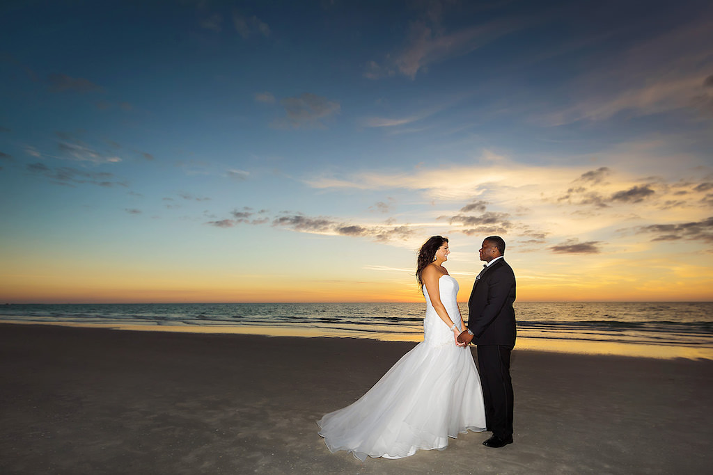Tampa Bay Bride and Groom Sunset Beach Portrait | The Pink Palace, Historic Beachfront Florida Wedding Venue The Don CeSar in St. Pete Beach