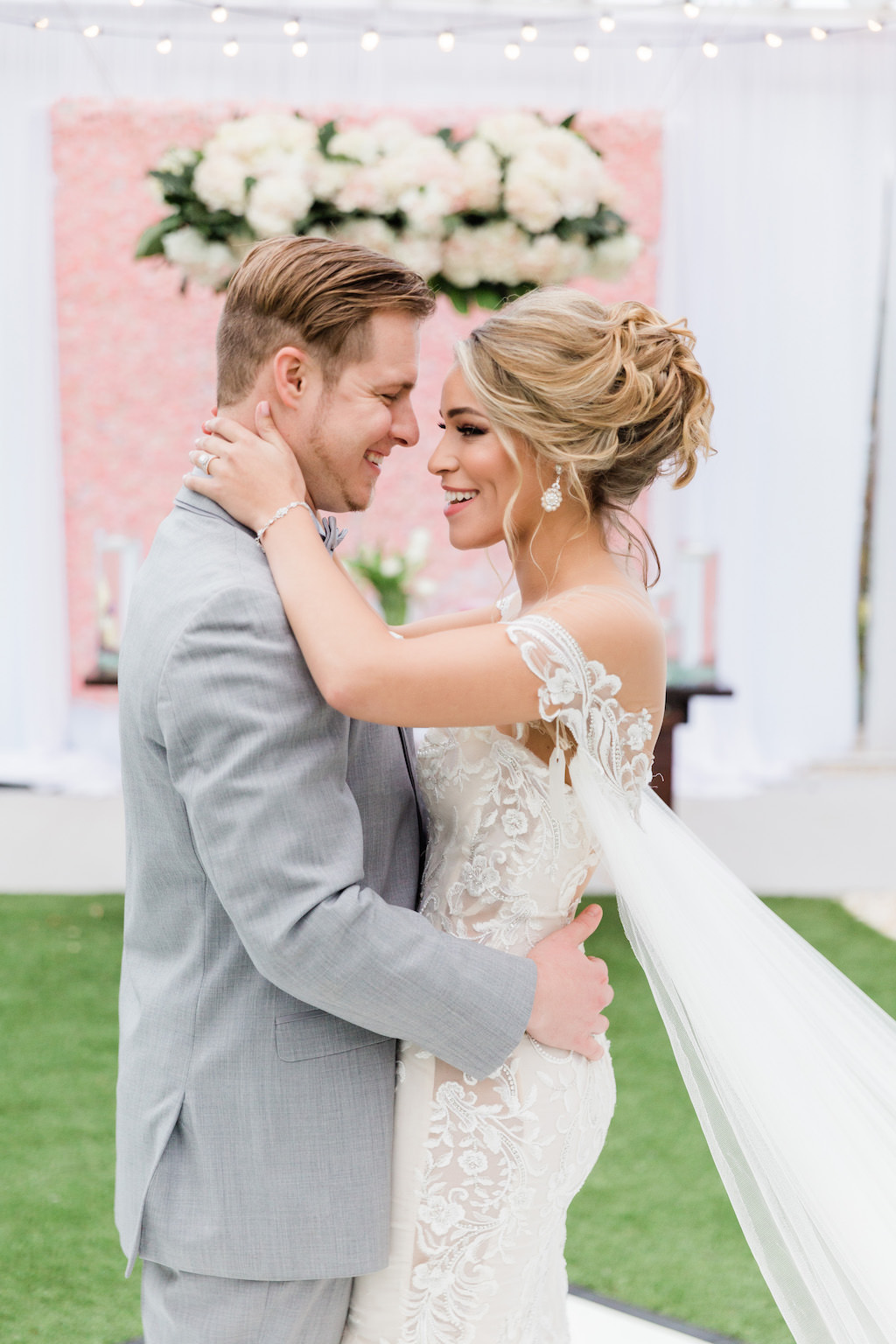 Modern Florida Bride and Groom on Dance Floor, Whimsical Garden Wedding Decor | Tampa Bay Hair and Makeup Artists Femme Akoi | Tampa Bay Couture Wedding Dress Boutique Isabel O'Neil Bridal Collection |