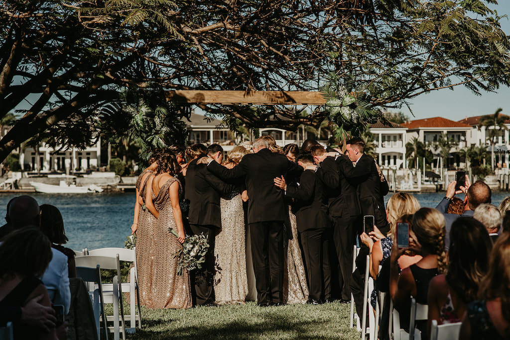 Waterfront Bridal Party Prayer Circle Wedding Photo | Tampa Wedding Venue Davis Islands Garden Club