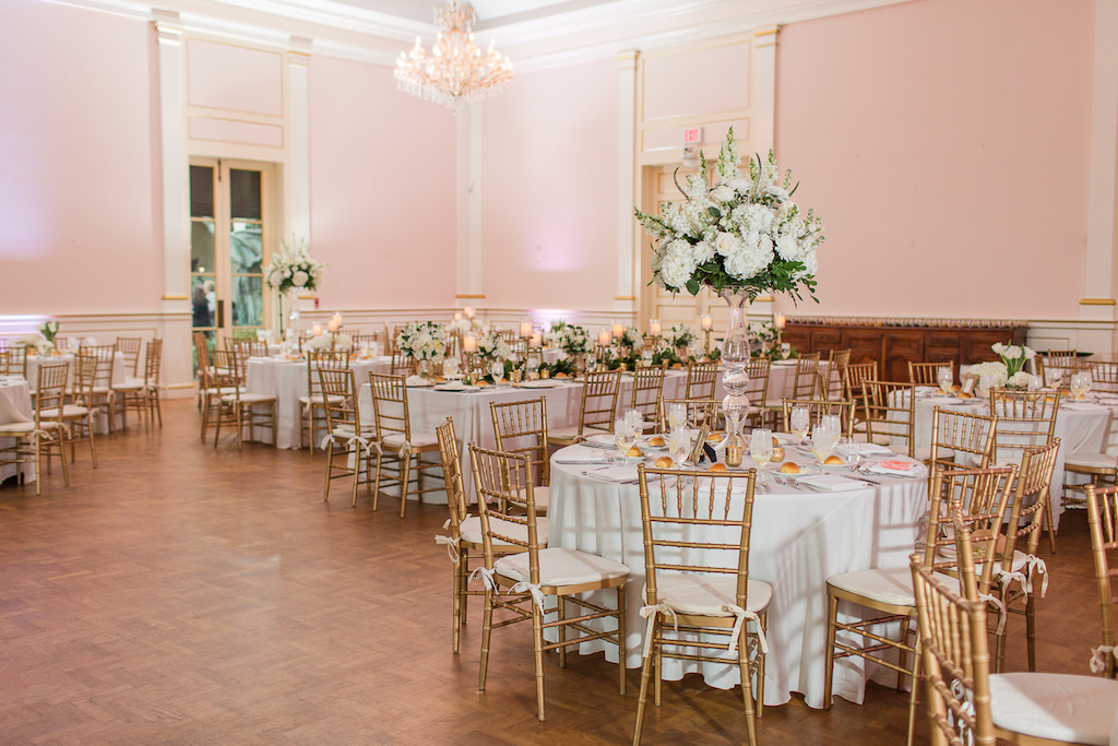 Classic, Romantic, Elegant Timeless Ballroom Wedding Reception Decor, Round Tables with White Linens, Gold Chiavari Chairs, Tall White Floral Centerpiece | St. Petersburg Wedding Venue Museum of Fine Arts | Wedding Rentals and Catering by Olympia Catering