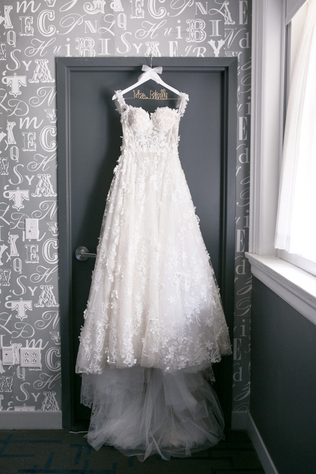 Lace Illusion and Tulle Ballgown Sweetheart Neckline with Straps Romantic Modern Galia Lahav Wedding Dress on Custom White Wooden and Wire Hanger | Tampa Bay Wedding Photographer Carrie Wildes Photography | Tampa Bay Bridal Shop Isabel O'Neil Bridal Collection