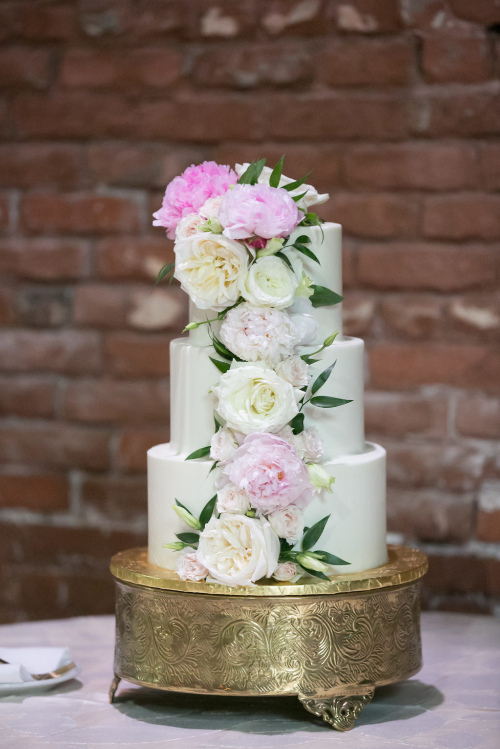 Classic Modern White Three Tier Round Wedding Cake with Ivory, Pink Real Cascading Flowers on Antique Gold Cake Stand | Tampa Bay Wedding Photographer Carrie Wildes Photography | Tampa Bay Wedding Cake Bakery The Artistic Whisk