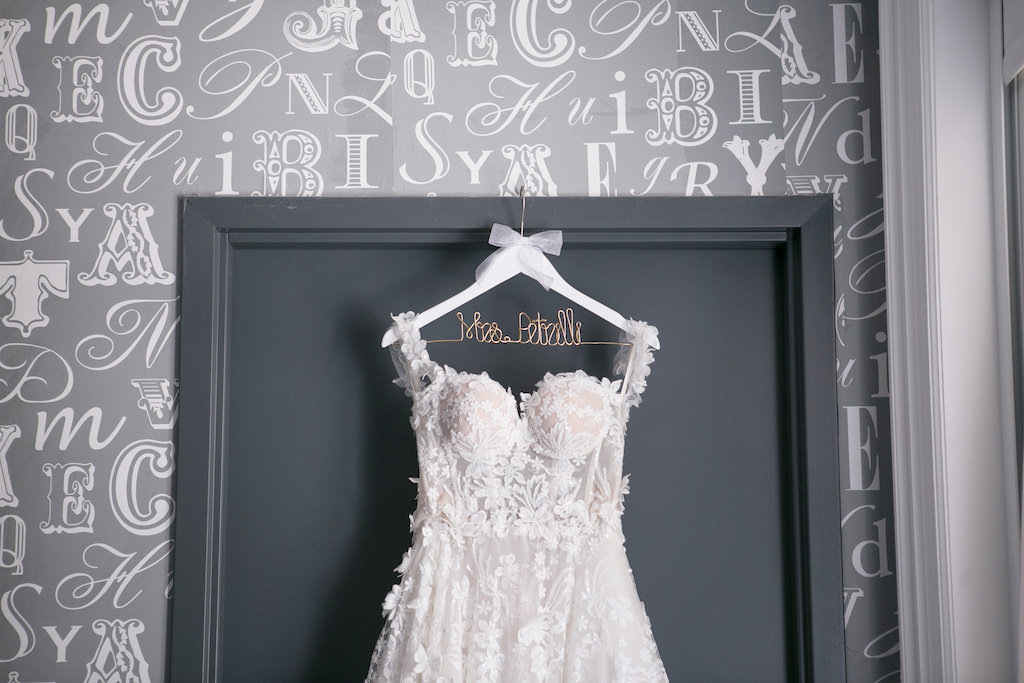 Lace, Illusion and Tulle Ballgown Sweetheart Neckline with Straps, Romantic Modern Galia Lahav Wedding Dress on Custom White Wooden and Wire Hanger | Tampa Bay Wedding Photographer Carrie Wildes Photography | Tampa Bay Bridal Shop Isabel O'Neil Bridal Collection