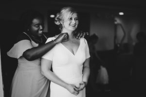 Florida Bride Getting Ready Black and White Wedding Photo in V Neckline With Sleeves Fitted Wedding Dress | Tampa Bay Wedding Hair and Makeup Femme Akoi