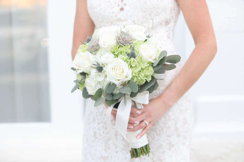 Tampa Bay Bride in Lace Wedding Dress Holding White, Ivory Roses, Green Hydrangeas, Succulents, and Silver Dollar Eucalyptus Floral Bouquet | Wedding Photographer Lifelong Photography Studios
