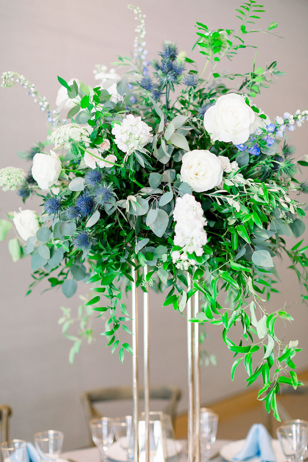 Marry Me Tampa Bay Before 5 Networking Event, St. Pete Venue Crawl | Tall Wedding Floral Centerpiece with Greenery, Blue and White Florals