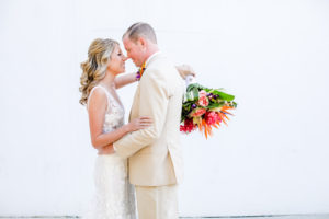 Elegant Florida Bride and Groom, Carrying Vibrant, Tropical Floral Bouquet, Colorful Island-Inspired Flowers Portrait | Tampa Bay Wedding Photographer Lifelong Photography Studios | Tampa Bay Wedding Hair and Makeup Artist Michele Renee The Studio 