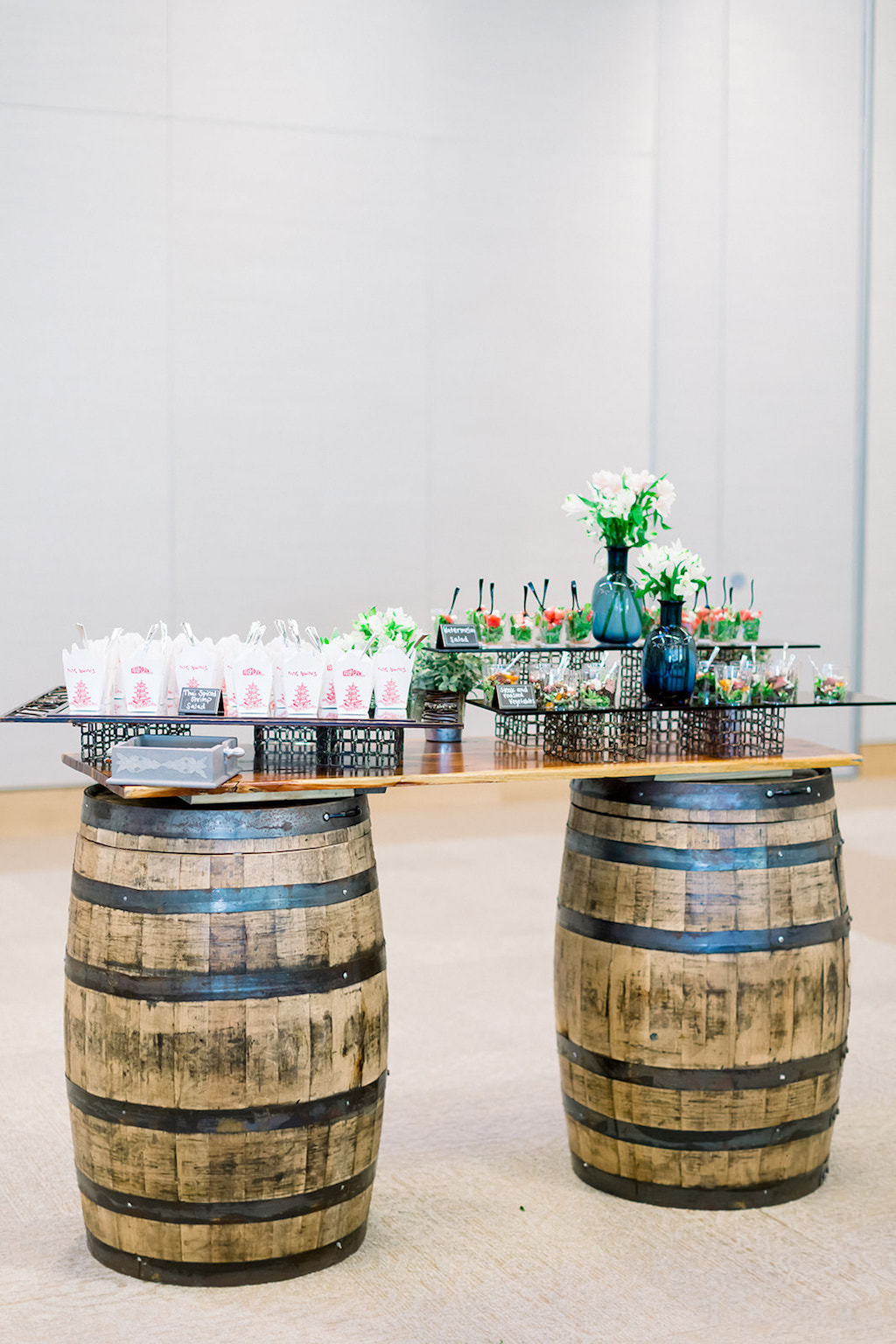 Marry Me Tampa Bay Before 5 Networking Event | St. Pete Venue Crawl | Unique Catering Display with Rustic Wooden Barrels at The James Museum for Western and Wildlife Art by Datz Catering Group