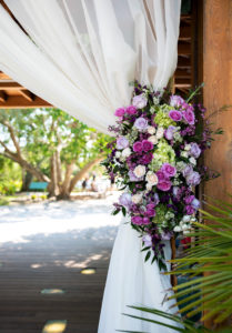 Sarasota Elegant, Classic Wedding Ceremony Decor, White Draping, Purple, Lilac Roses, Green Hydrangeas, Blush Pink and Greenery Floral Arrangement