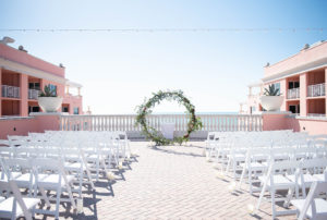 INSTAGRAM WEEKLY ROUND UP Elegant Wedding Ceremony Decor, White Folding Chairs, Circular Arch with Greenery and Floral Arrangements | Wedding Venue Hyatt Regency Clearwater Beach | Wedding and Event Rentals Gabro Event Services