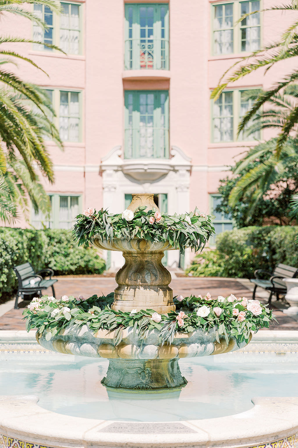 Elegant Outdoor Courtyard Wedding Ceremony Decor, Water Fountain with Greenery Wreaths and White and Blush Pink Florals | St. Petersburg Hotel Wedding Venue The Vinoy Renaissance