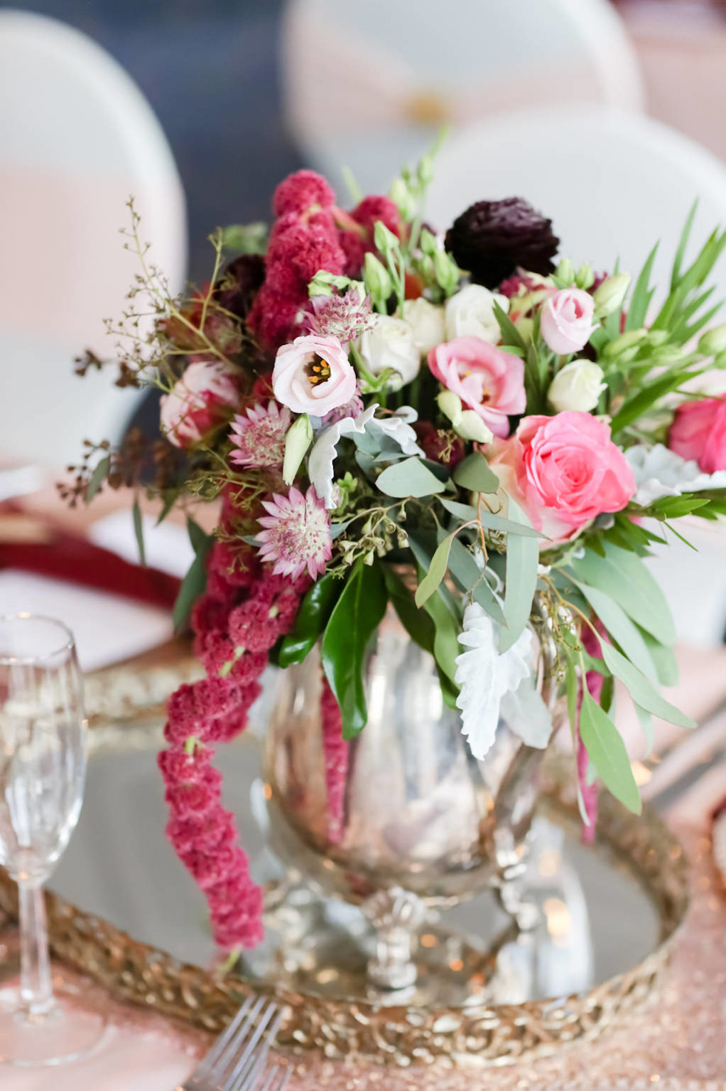 French Country Inspired Wedding Reception Decor, Low Silver Vase on Antique Mirror Tray with Pink, Dark Purple, Baby Pink, Greenery and Pink Hanging Amaranthus Floral Centerpiece | Tampa Bay Wedding Photographer Lifelong Photography Studio | Wedding Rentals Kate Ryan Event Rentals