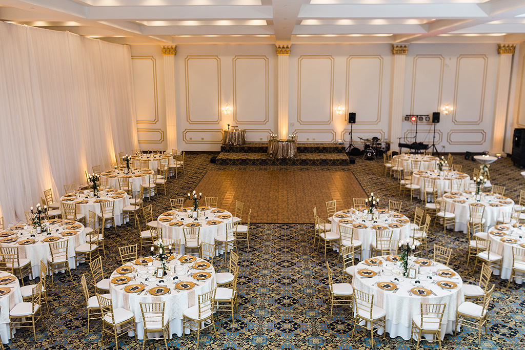 Elegant, Luxurious Gold and White Wedding Decor and Reception, Tampa Ballroom, White Draping, Gold Chiavari Chairs, Round Tables, Chargers Tampa Bay Wedding Planner Coastal Coordinating | Historic Downtown Tampa Wedding Venue Hotel Floridan Palace Hotel
