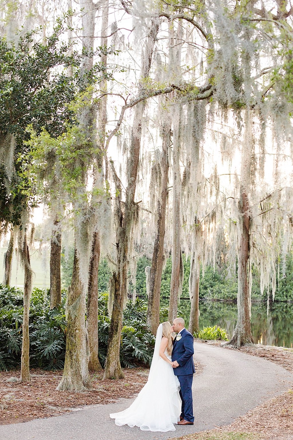 Florida Bride and Groom Intimate Romantic Outdoor Under Trees Wedding Portrait | Tampa Bay Wedding Venue Innisbrook Golf and Spa Resort
