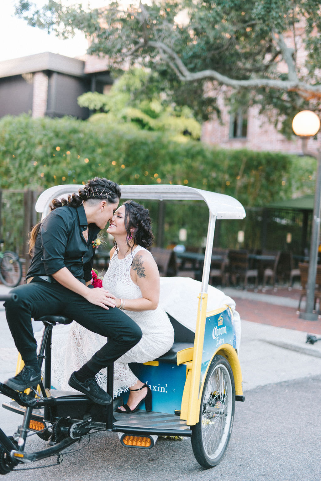 Outdoor Florida Lesbian Gay Wedding Portrait on St. Pete Pedicab | Tampa Bay Wedding Photographer Kera Photography